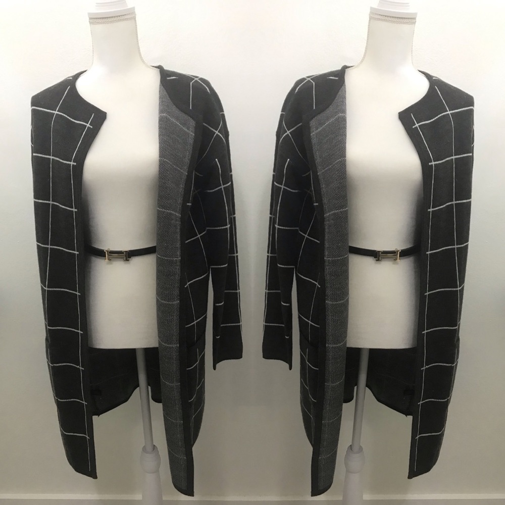 The limited NWT long black cardigan